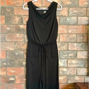 Black jumpsuit. Great used condition. Hidden back zipper.